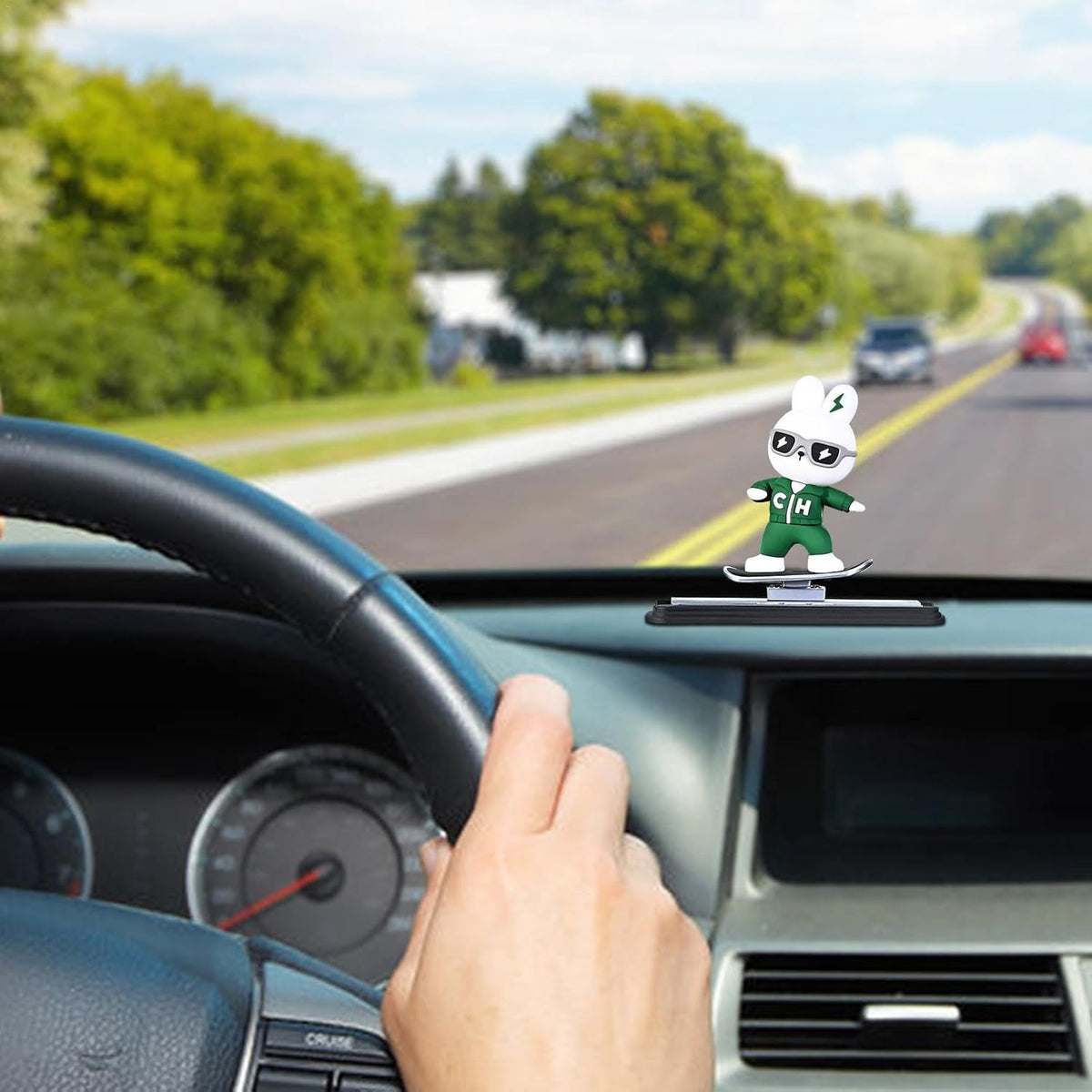 Skateboarding bunny car dashboard figure, green and white, 9cm