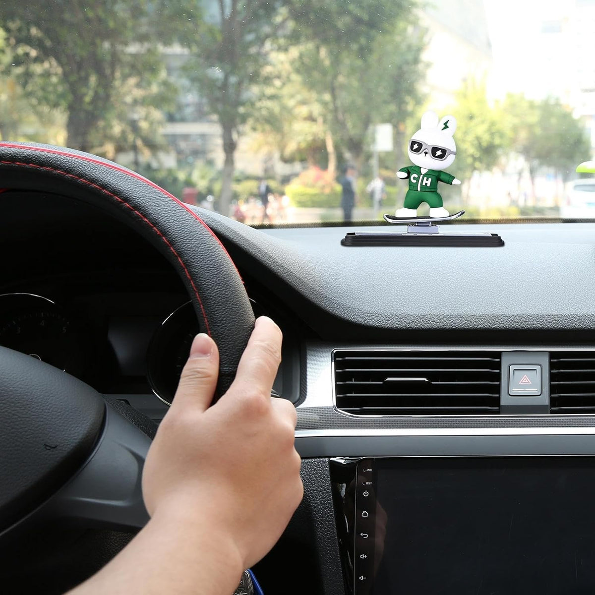 Skateboarding bunny car dashboard figure, green and white, 9cm