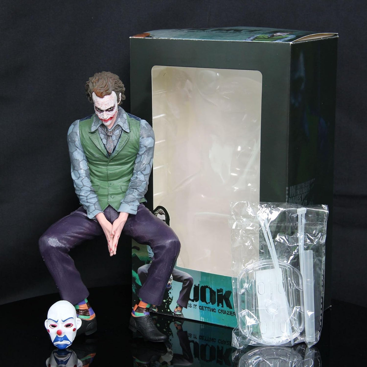 CarDost Joker action figure statue, 24cm, seated pose
